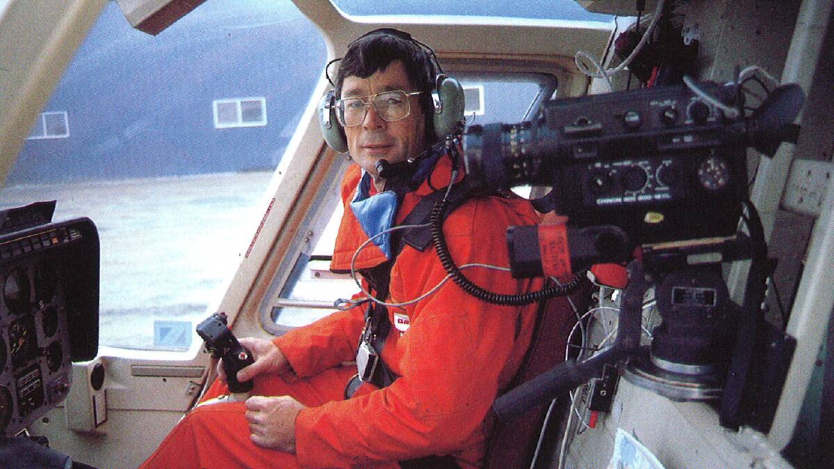 Filming for a documentary film during one of his helicopter adventures.