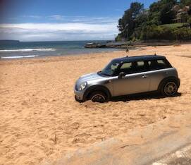 BEACHED: Tim Parry sent in this photograph taken last week at Palm Beach, with the caption: Advice for Summer: Just drive to the beach; not onto it... 