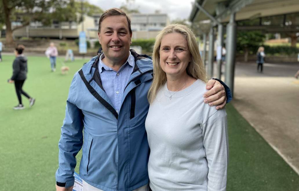 FAMILY: Incumbent Liberal MP for Mackellar, Jason Falinski, with his wife Nichola Constant at the polling centre in Collaroy Plateau Public School. Picture: Nadine Morton