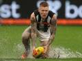 Collingwood bad boy Jordan De Goey is back for what's expected to be a wet clash with Gold Coast.