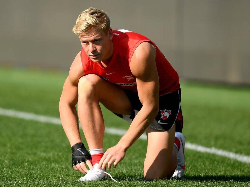 Sydney forward Isaac Heeney is hopeful of overcoming injury to face Collingwood at the SCG.