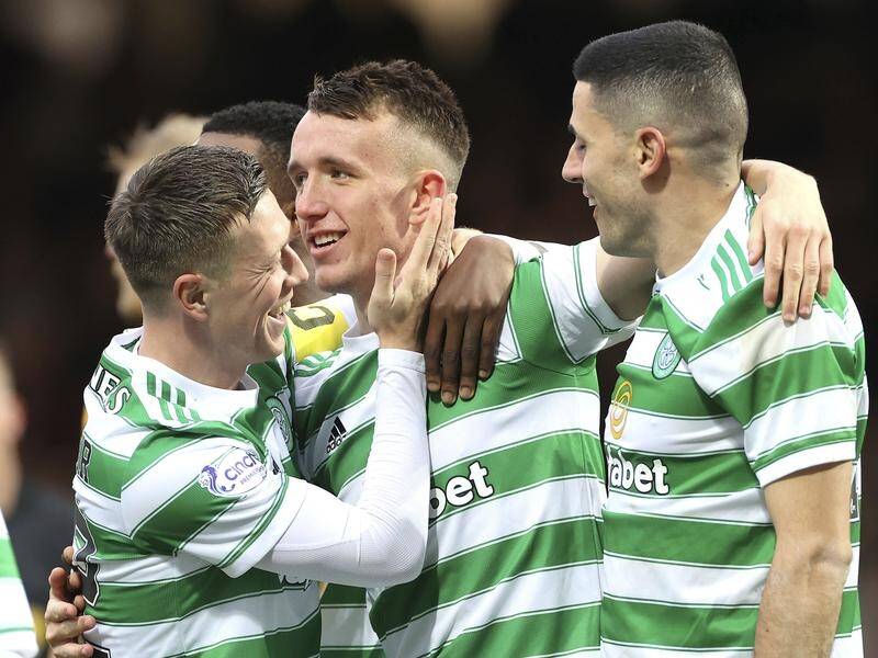 David Turnbull has sealed a Scottish Premiership win for Ange Postecoglou's Celtic over Motherwell.