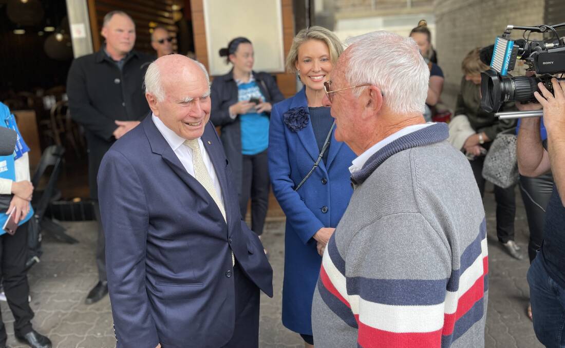 SUPPORTER: Former Prime Minister John Howard and Liberal candidate for Warringah Katherine Deves meeting people in Manly. Picture: Nadine Morton