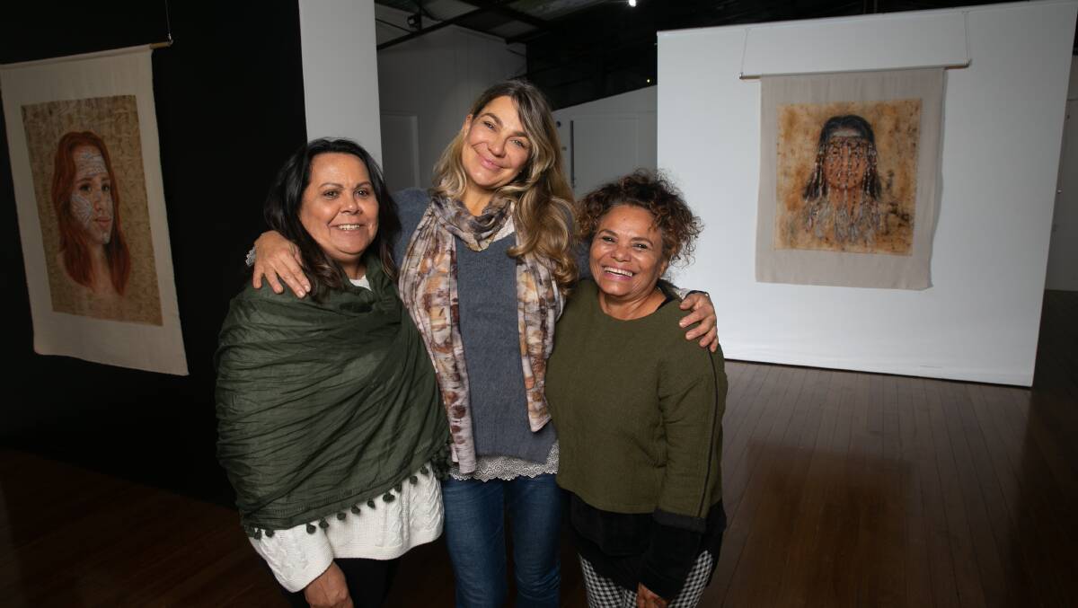Artist Heidi Lee Warta (centre) with Lana Kelly and Caroline Glass-Pattison who feature in the Ochre Woman exhibition. Picture: Geoff Jones