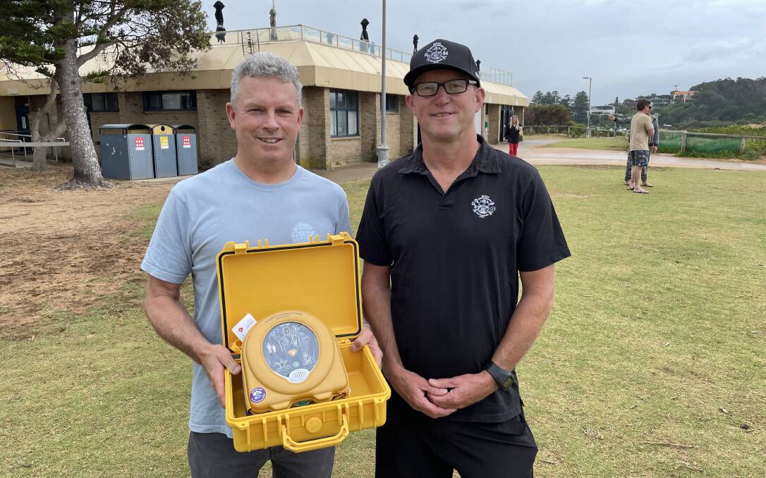 HELP FOR ALL: North Narrabeen Boardriders Club president Damien Hardman and vice president Brian Lawson with the lifesaving technology. Picture: Nadine Morton