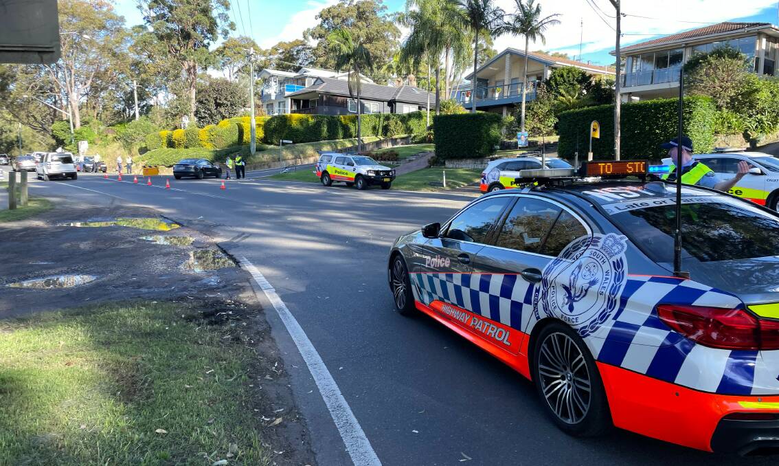 CRASH SCENE: A male cyclist aged in his 40s is in hospital with head injuries following a crash in Bayview on Saturday afternoon. Picture: Nadine Morton