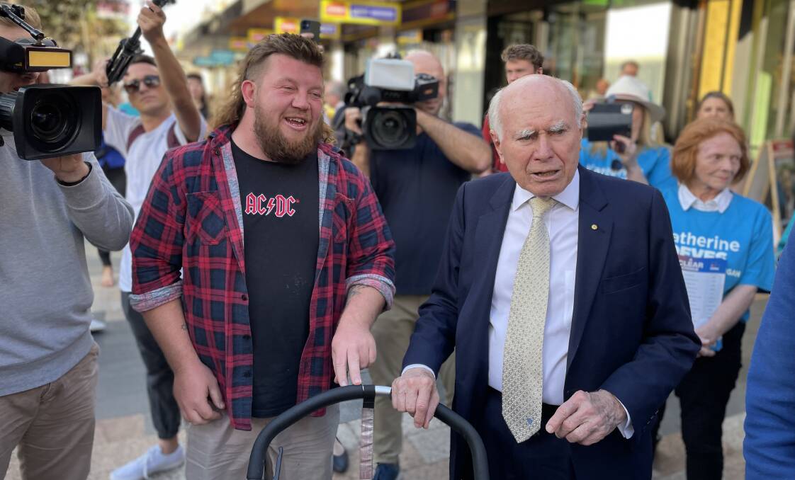 SUPPORTER: Former Prime Minister John Howard meeting people in Manly on Wednesday. Picture: Nadine Morton