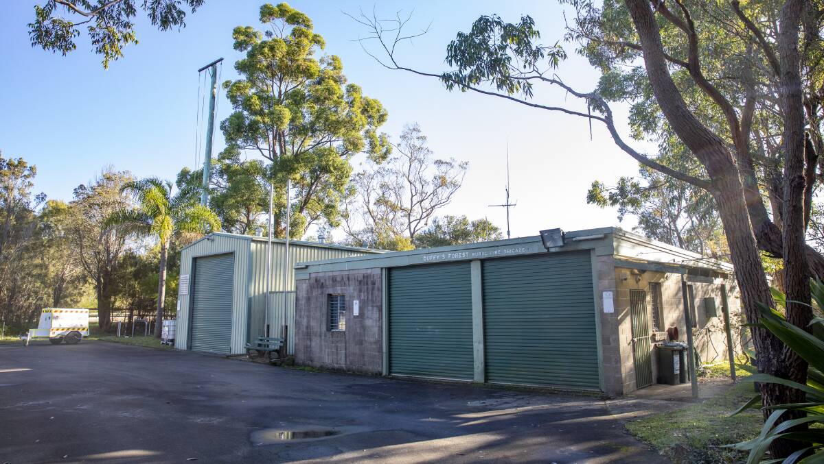 PROMISE: NSW Rural Fire Service volunteers at Duffys Forest Brigade will get a new fire station, thanks to a pre-election funding promise by incumbent Liberal MP Jason Falinski. Picture: Dallas Kilponen