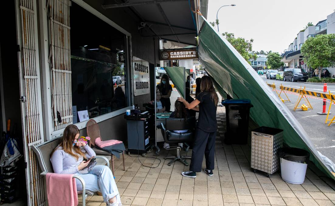 ON THE STREETS: Cassidy's of Harbord was granted a council exemption to work from the footpath outside the salon. Picture: Geoff Jones