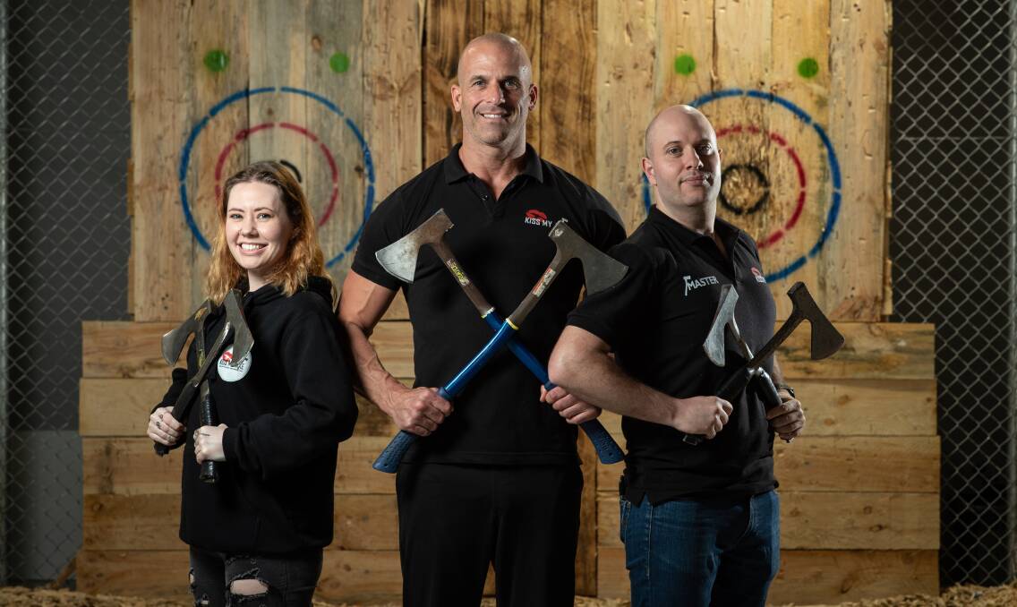 BUSINESS BOOST: Steph Olford, Ian Williams and Matt Rose from Brookvale business Kiss My Axe are accepting 80-100 Dine and Discover vouchers each week. Picture: Julian Andrews