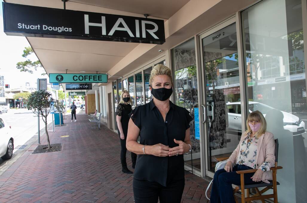 ON THE STREETS: Stuart Douglass Hair Design owner Kathryn Vidulic says her council exemption allows her to use the footpath as a waiting room. Picture: Geoff Jones