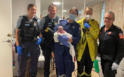 EMERGENCY CALL: Police, fire and ambulance crews were called to help after a woman gave birth in her Warriewood home on Friday. Picture: Fire and Rescue NSW