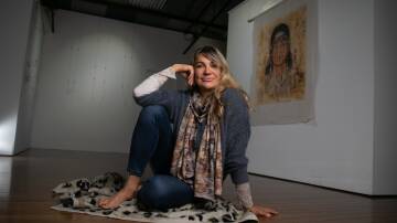NAIDOC WEEK: Artist Heidi Lee Warta with one of her artworks that is featuring in the Ochre Woman exhibition. Picture: Geoff Jones